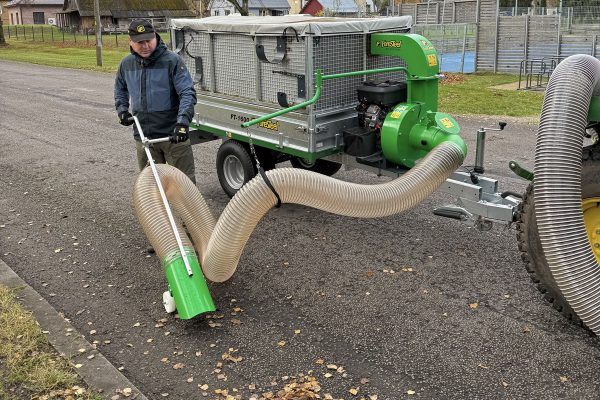 Foresteel-FT-1600-Leaf-Trailer-with-John-Deere-3R-tractor-mowing-deck-setup-43-07
